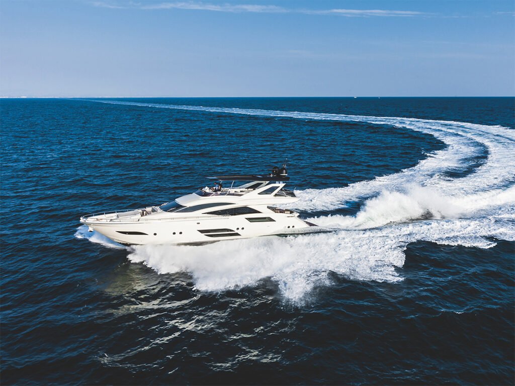 yacht leaving a long wake